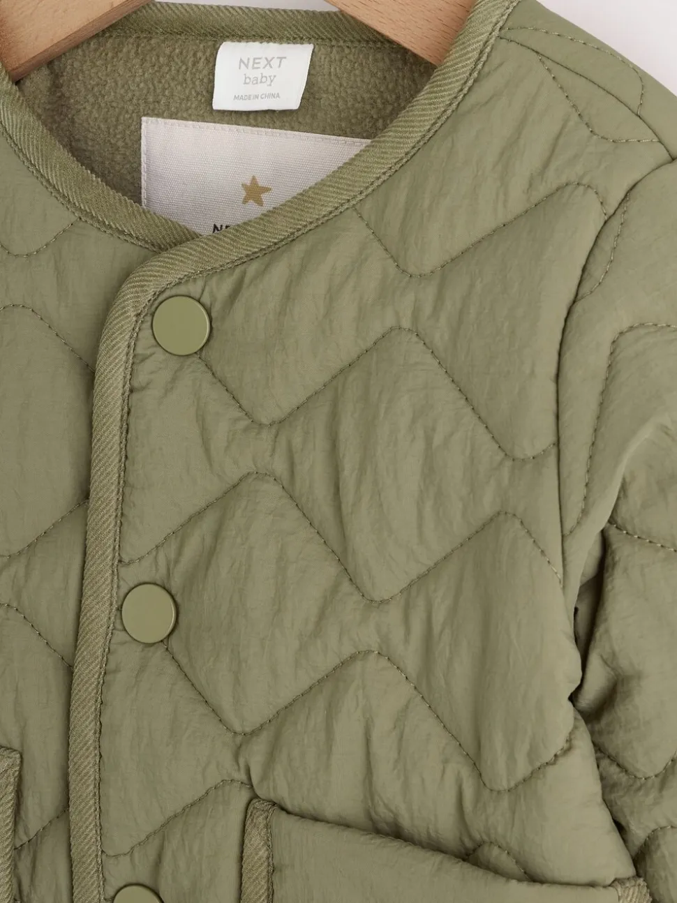 Kakigroen - Nylon gewatteerd babyjack (0mnd-2jr)