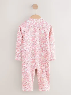 Koraalroze met fijne bloemenprint - Zonbeschermend badpak met lange pijpen (3 mnd-7 jr)