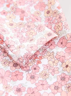 Koraalroze met fijne bloemenprint - Zonbeschermend badpak met lange pijpen (3 mnd-7 jr)