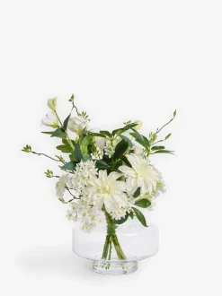 Kunstbloemenarrangement in glazen vaas