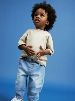Lichtblauwe denim - Jeans met geplooide voorkant (3mnd-7jr)