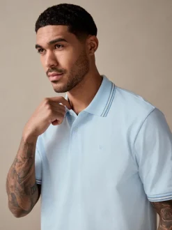 Lichtblauwe ottoman - Regular fit poloshirt met korte mouwen en contrasterende randen