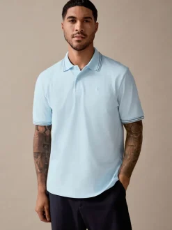 Lichtblauwe ottoman - Regular fit poloshirt met korte mouwen en contrasterende randen