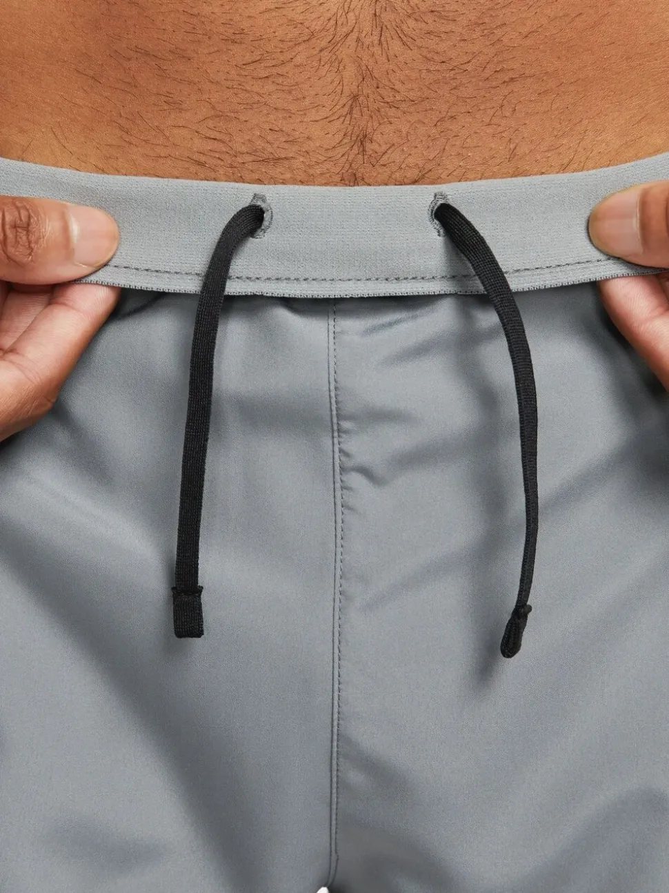 Lichtgrijs - Nike Dri-FIT Challenger 5 Inch hardloopshorts met slipvoering