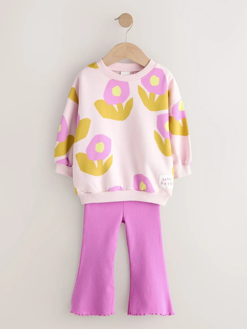 Lichtroze bloemen - Set van sweatshirt en uitlopende legging (3mnd -7jr)