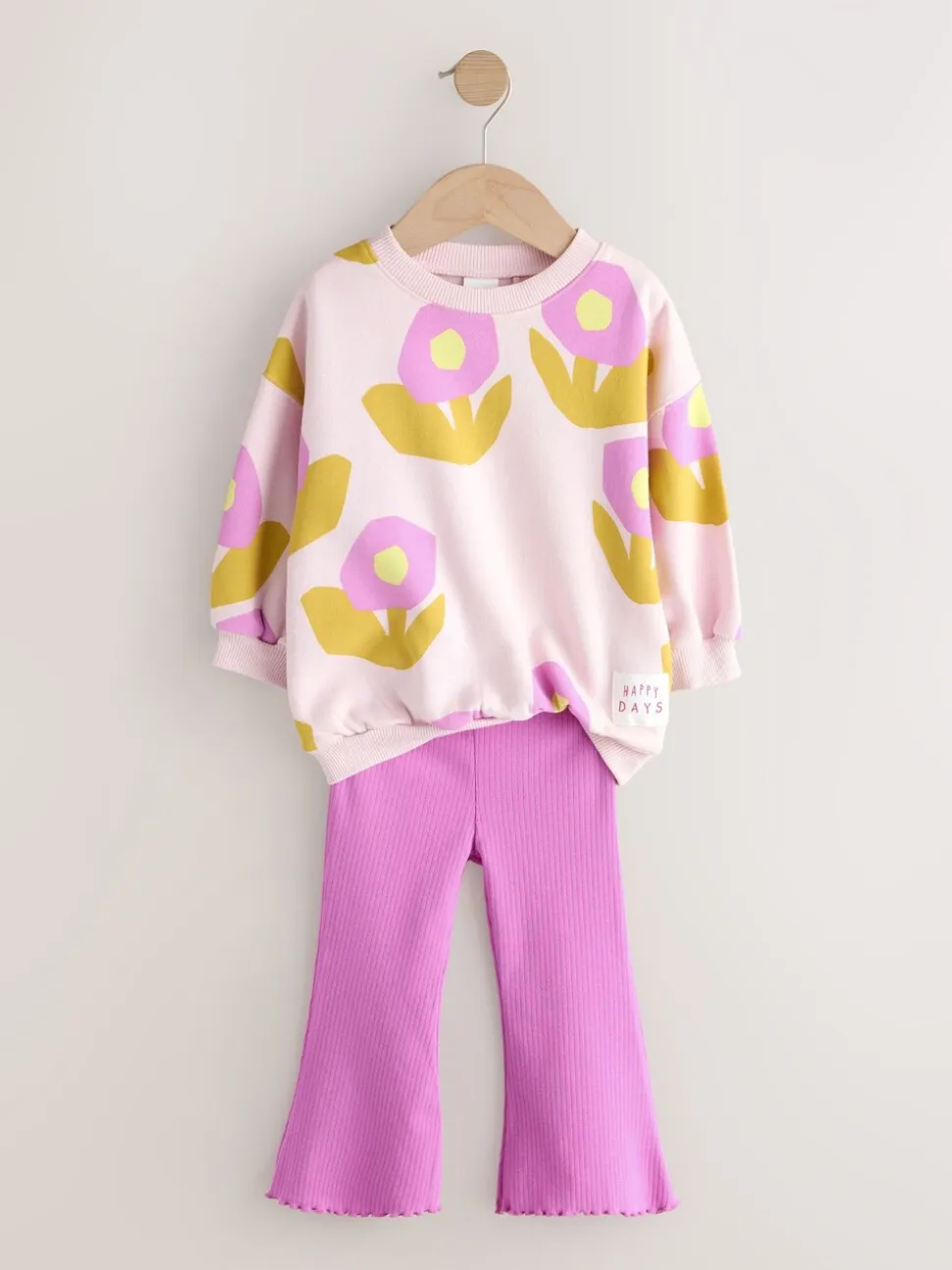 Lichtroze bloemen - Set van sweatshirt en uitlopende legging (3mnd -7jr)
