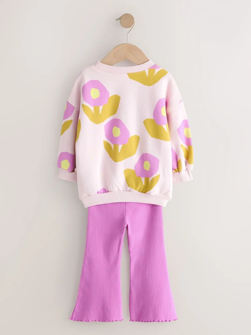 Lichtroze bloemen - Set van sweatshirt en uitlopende legging (3mnd -7jr)