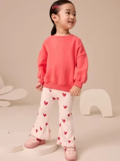 Lichtroze met hartje - Geribbelde flare legging (3 mnd-7 jr)