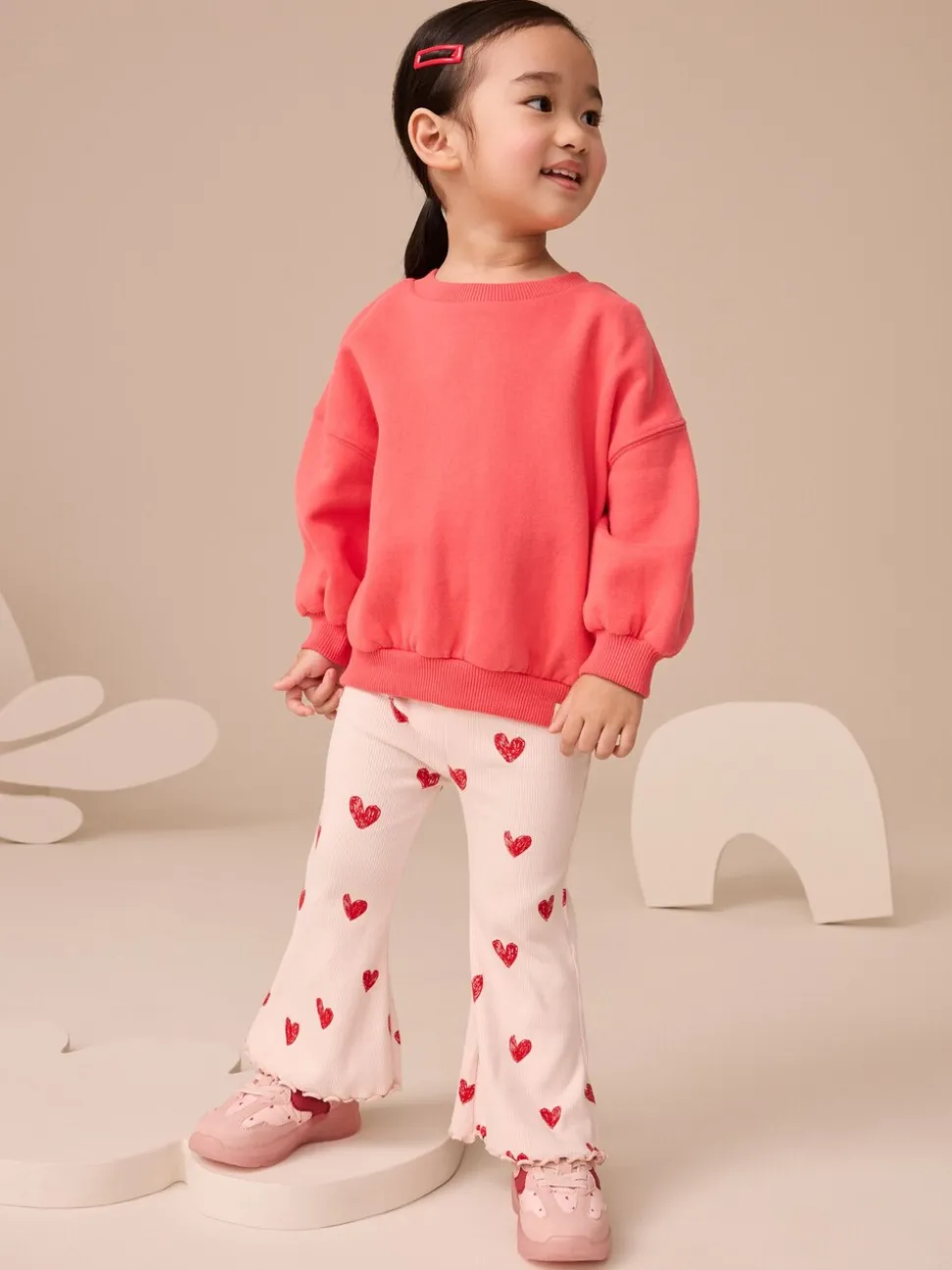 Lichtroze met hartje - Geribbelde flare legging (3 mnd-7 jr)