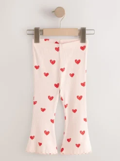 Lichtroze met hartje - Geribbelde flare legging (3 mnd-7 jr)