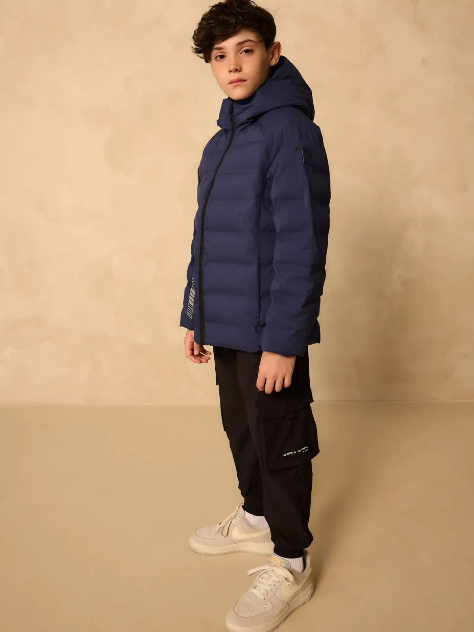 Marineblauw - Waterdicht halfzwaar jack met capuchon (3-17jr)