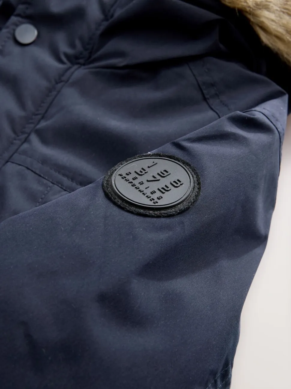 Marineblauw - Zware regenbestendige parka met imitatiebontrand (3-16jr)
