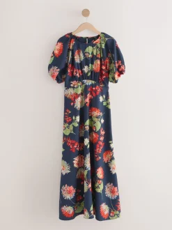 Marineblauw met bloemenprint - Midi-jurk met print en pofmouwen