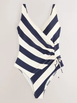 Marineblauw/crèmekleurig - Badpak met vormgevende zijrimpeling en buikcorrectie