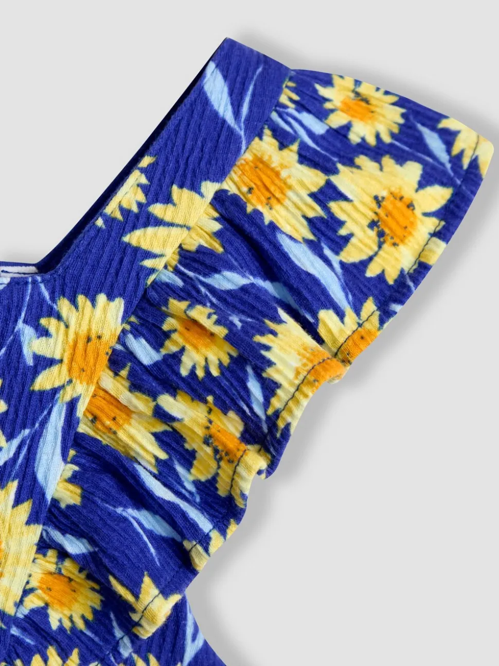 Marineblauwe zonnebloem - JoJo Maman Bébé jumpsuit met ruches vooraan