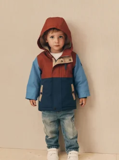 Marineblauw/rood met kleurvlakken - Waterdichte parka met borgvoering (3mnd -7jr)