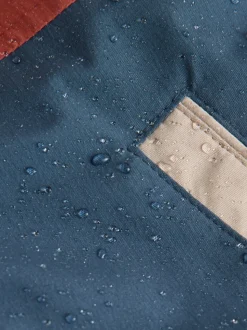 Marineblauw/rood met kleurvlakken - Waterdichte parka met borgvoering (3mnd -7jr)