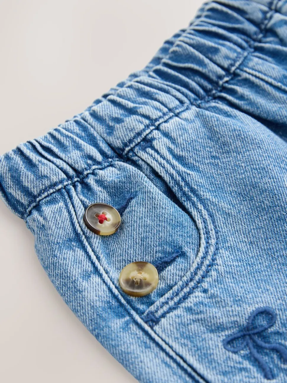 Middenblauw denim - Jeans met strikborduursel (3mnd -7jr)