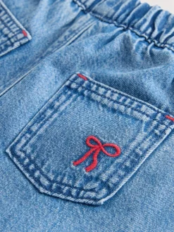 Middenblauw denim - Jeans met strikborduursel (3mnd -7jr)