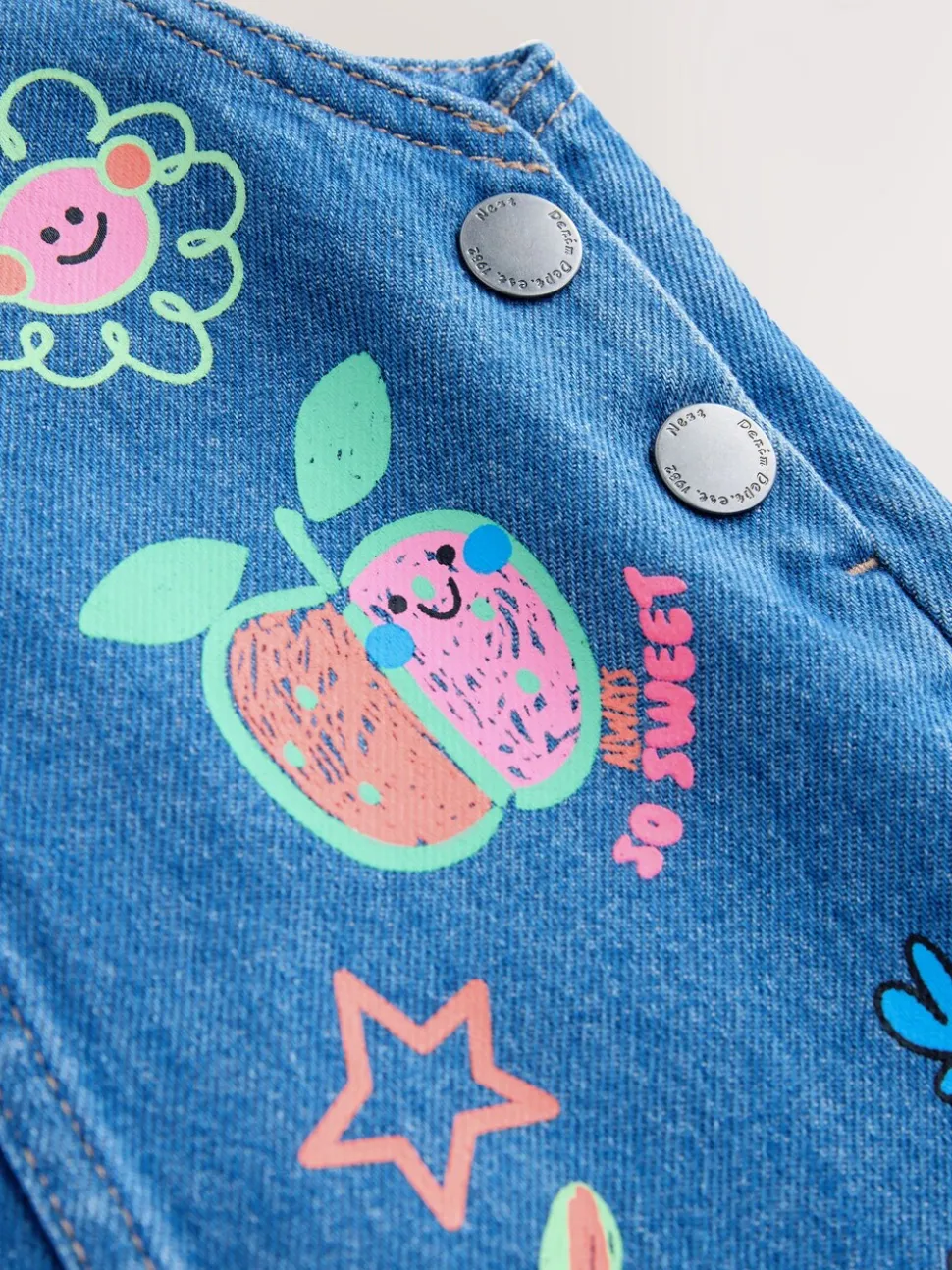 Middenblauw met figuur - Denim overgooier (3 mnd-8 jr)