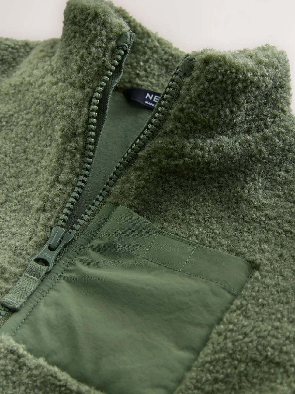 Mineraalkleurig - Effen fleece met rits en trechterhals (3mnd-7jr)