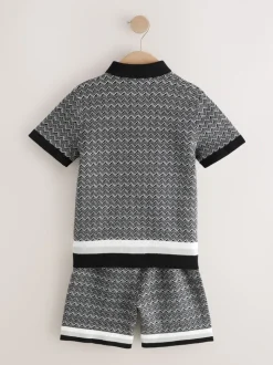 Monochroom - Set met gebreid poloshirt met knoopsluiting en short met geometrische print (3-16jr)