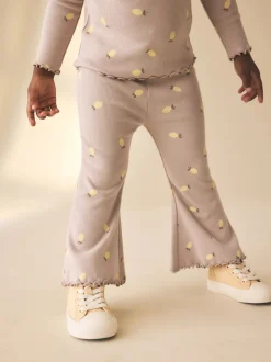 Naturel met citroenprint - Geribbelde flare legging (3 mnd-7 jr)