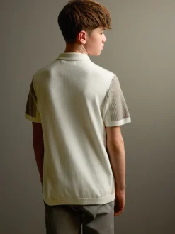 Neutraal met kleurvlakken - Gebreid poloshirt met rits bij de hals (3-16jr)