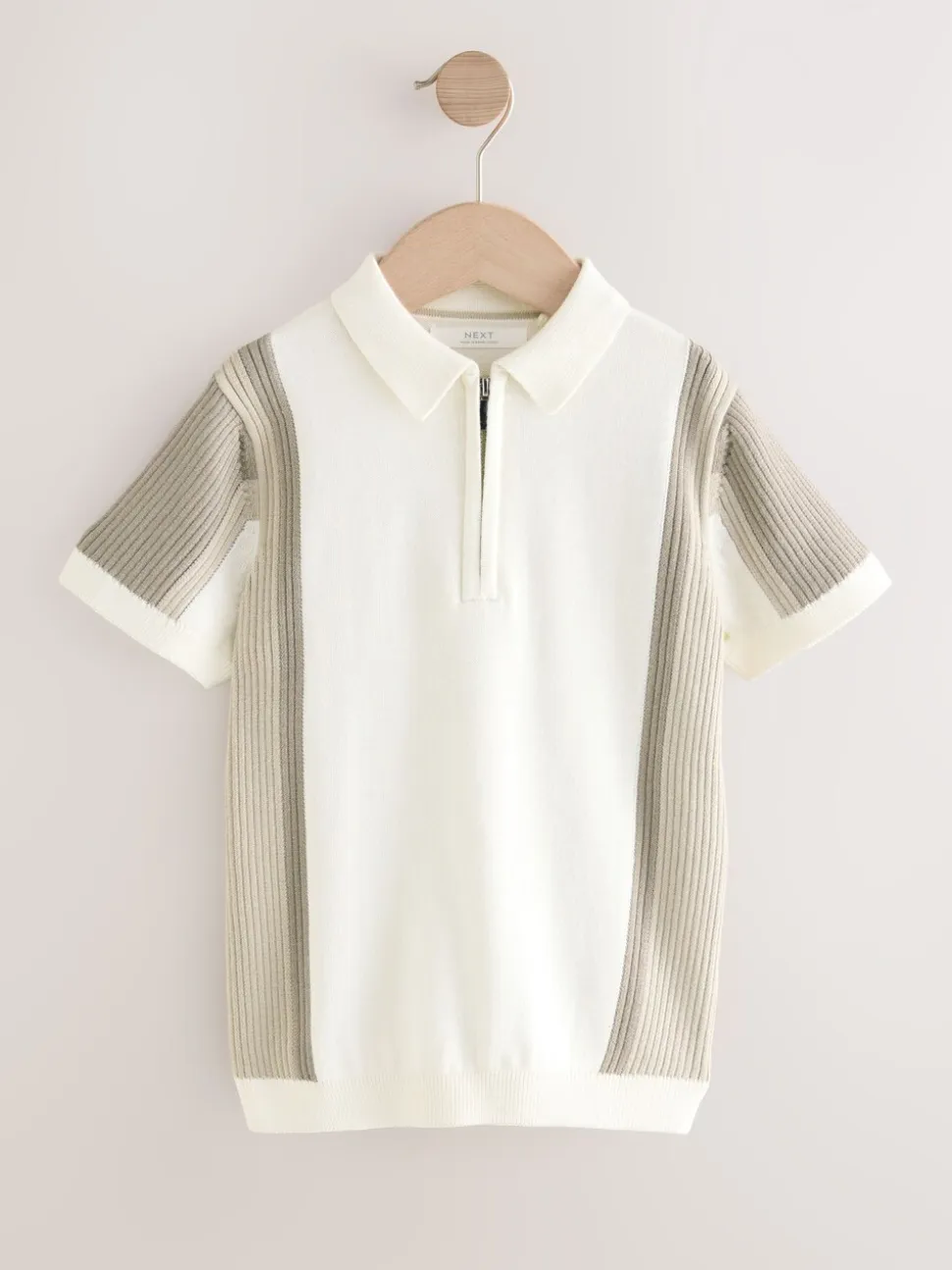 Neutraal met kleurvlakken - Gebreid poloshirt met rits bij de hals (3-16jr)