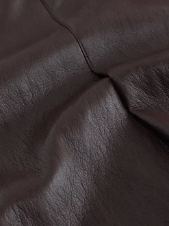 Nothing Ordinary Faux Leather Wrap Midi Kilt Skirt