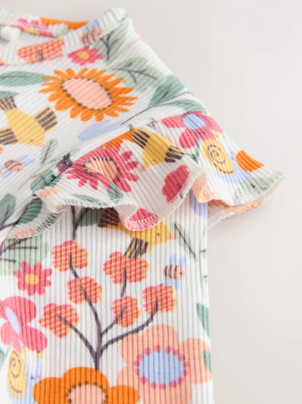 Oranje fijn gebloemd - Long Sleeve Ribbed Frill Top (3mths-7yrs)