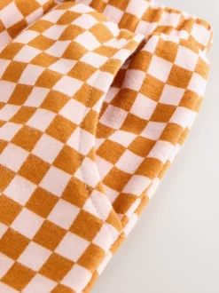 Oranje met dambordmotief - Broek met wijde kortere pijpen (3mnd -7jr)