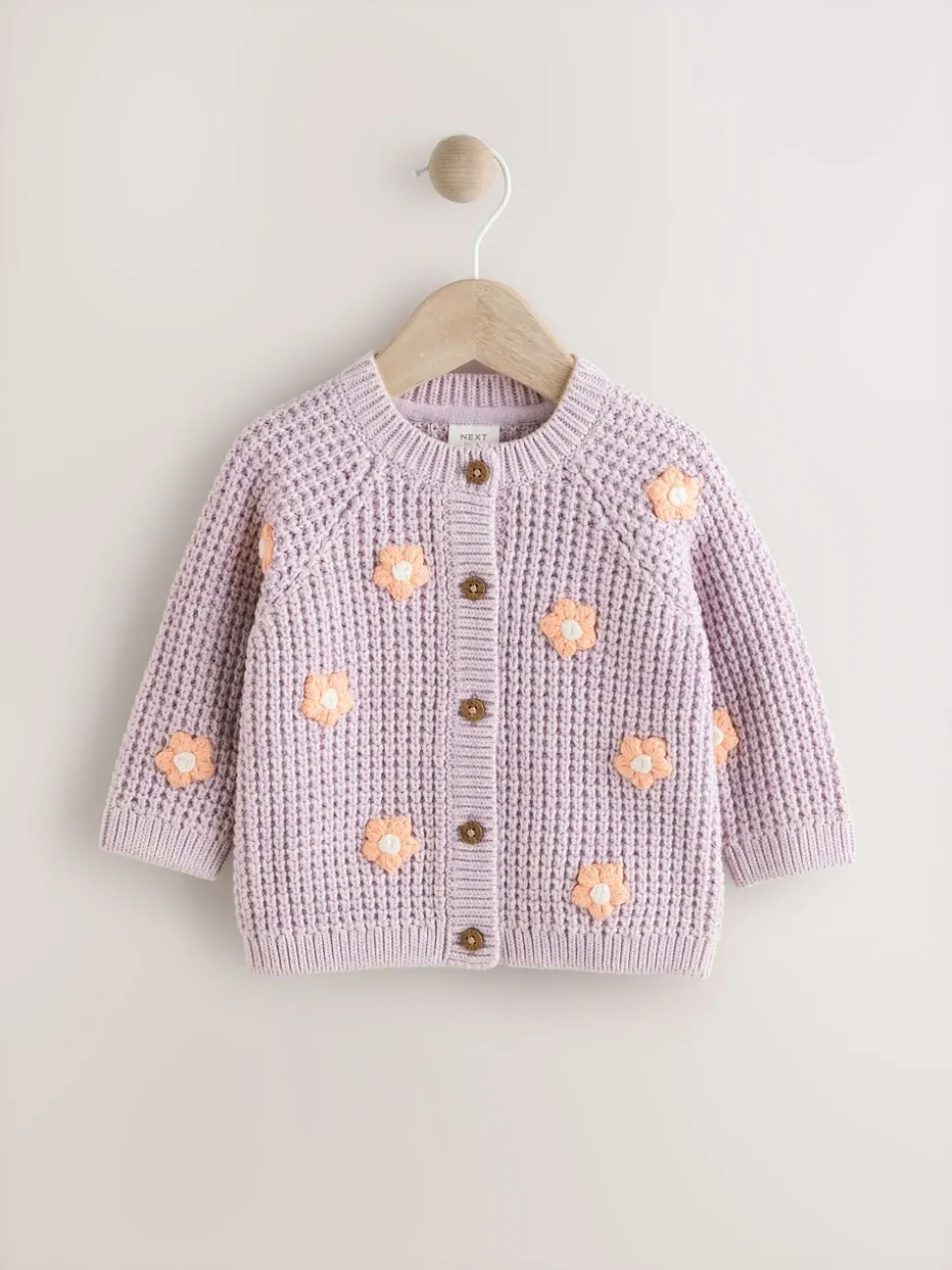 Paarse en abrikozenkleurige bloemen voor baby's - Geborduurd vest (0 mnd - 2 jr)