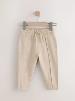 Pastelgeel - Pintuck joggingbroek van 100% katoen (3mnds-7jr)