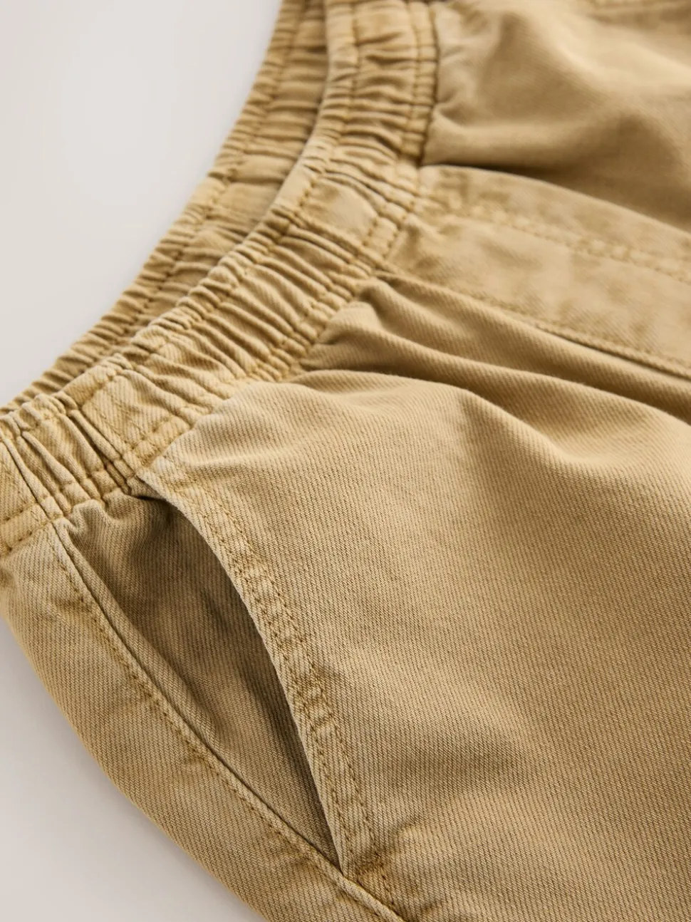 Pastelgeel - Twill jeans met aantrekkoord (3-16jr)