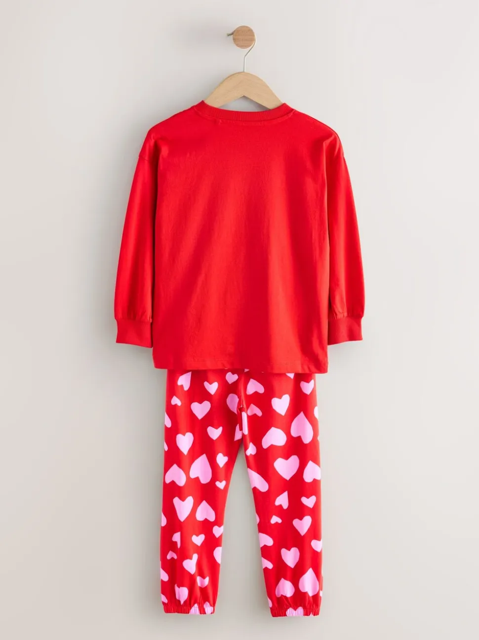 Rode strikken/hartjes - Verpakking van 3 pyjama's met joggingbroek (3-16 jr)
