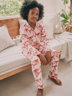 Rode/witte strik print - Pyjama met knoopsluiting (3-16jr)