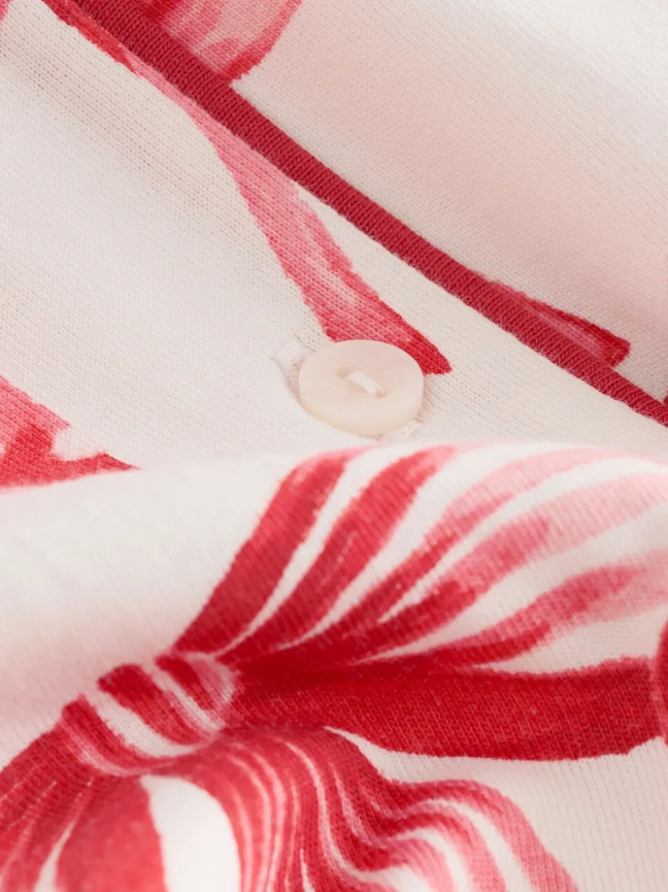 Rode/witte strik print - Pyjama met knoopsluiting (3-16jr)