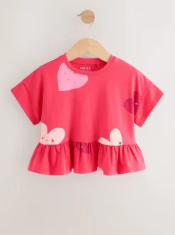 Rood met hartjesprint - T-shirt met peplum en korte mouwen (3mnd -7jr)