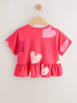 Rood met hartjesprint - T-shirt met peplum en korte mouwen (3mnd -7jr)