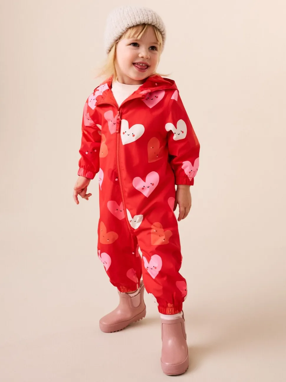 Rood met hartjesprint - Waterbestendig regenpak met print (6 mnd-7 jr)