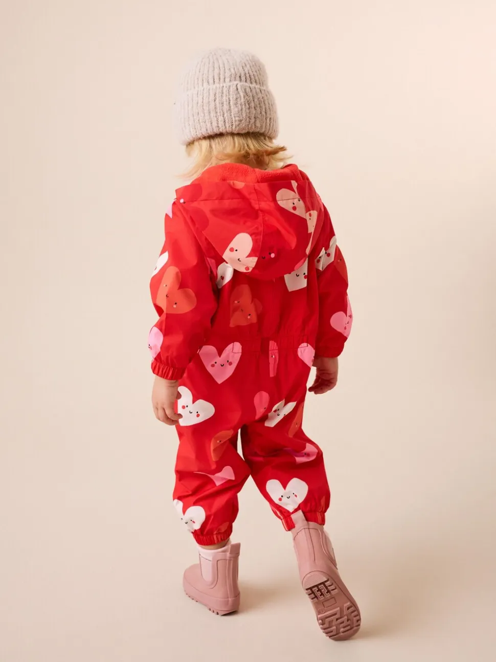 Rood met hartjesprint - Waterbestendig regenpak met print (6 mnd-7 jr)