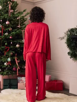 Rood met sterren - Zachte pyjama met lange mouwen en hartjesprint