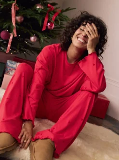 Rood met sterren - Zachte pyjama met lange mouwen en hartjesprint