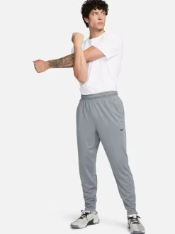 Rookgrijs - Nike Dri-FIT Totality trainingsbroek met taps toelopende pijpen