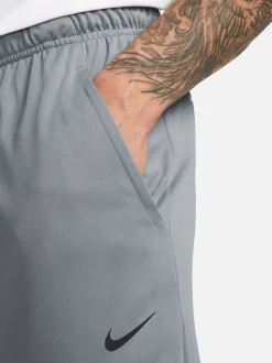 Rookgrijs - Nike Dri-FIT Totality trainingsbroek met taps toelopende pijpen