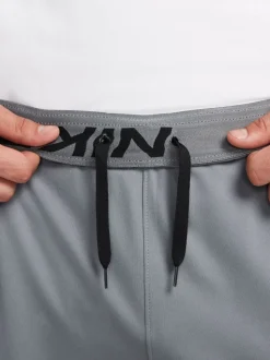 Rookgrijs - Nike Dri-FIT Totality trainingsbroek met taps toelopende pijpen