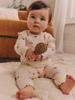 Roomkleurig met vrolijke figuurtjes - 2 -delige babyset van top en legging (0mnd -2jr)