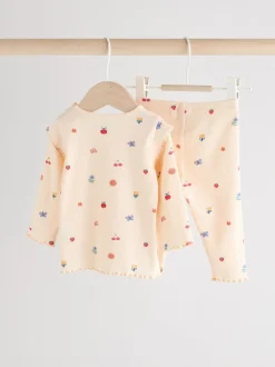 Roomkleurig met vrolijke figuurtjes - 2 -delige babyset van top en legging (0mnd -2jr)