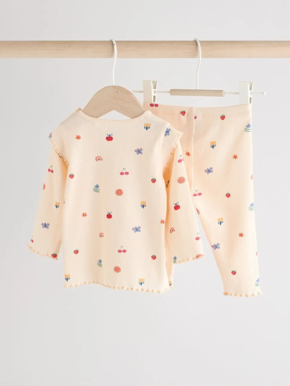 Roomkleurig met vrolijke figuurtjes - 2 -delige babyset van top en legging (0mnd -2jr)
